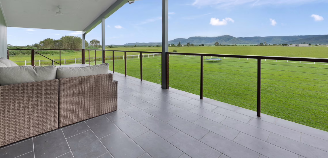 Covered outdoor deck with scenic rural views built by NV Builders near Mackay