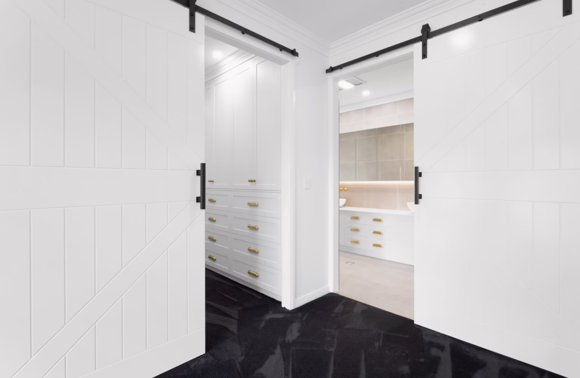 Sliding Barn Doors Leading to Luxury Ensuite and Walk-in Robe